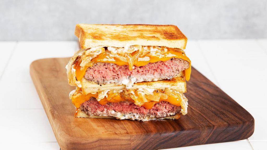 Patty Melt · Griddled sandwich with burger patty, melted yellow cheddar, mayonnaise, caramelized onions, and your choice of bread.