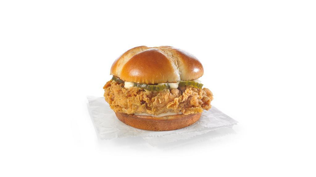 Spicy Chicken Sandwich  · We placed over 65 years of delicious into this sandwich. Taste our legendary hand-battered chicken, topped with a signature honey-butter brushed brioche bun with mayo and pickles.