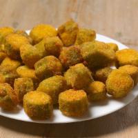Fried Okra (Regular) · Church's® fried okra is cut into delicious bite-sized bits, then fried to the perfect level ...
