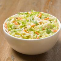 Cole Slaw · Creamy, tangy, and delicious.  It's the cole slaw with no flaws.