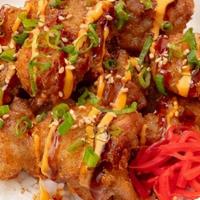 Chicken Karaage Bowl · Japanese style fried chicken, teriyaki sauce, spicy aioli, green onion and red ginger over r...