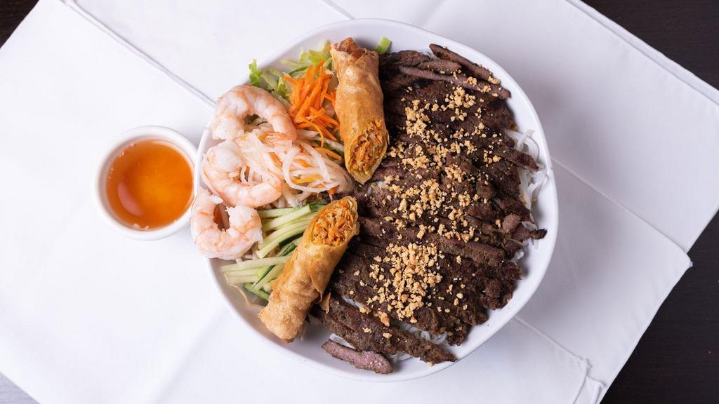 Charbroiled Beef  Vm · Chilled rice vermicelli with charbroiled beef , served with shredded lettuce, shredded cucumber, bean sprout and pickled carrots and daikon. fish sauces on the side.