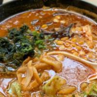 Spicy Miso Ramen · Pork and spicy miso broth: pork chashu, bamboo shoot, green onion, egg, kizami chill, bean s...