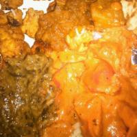 Chicken Tikka · Yogurt and spices marinated boneless white chicken cooked in tandoor then seasoned with cila...