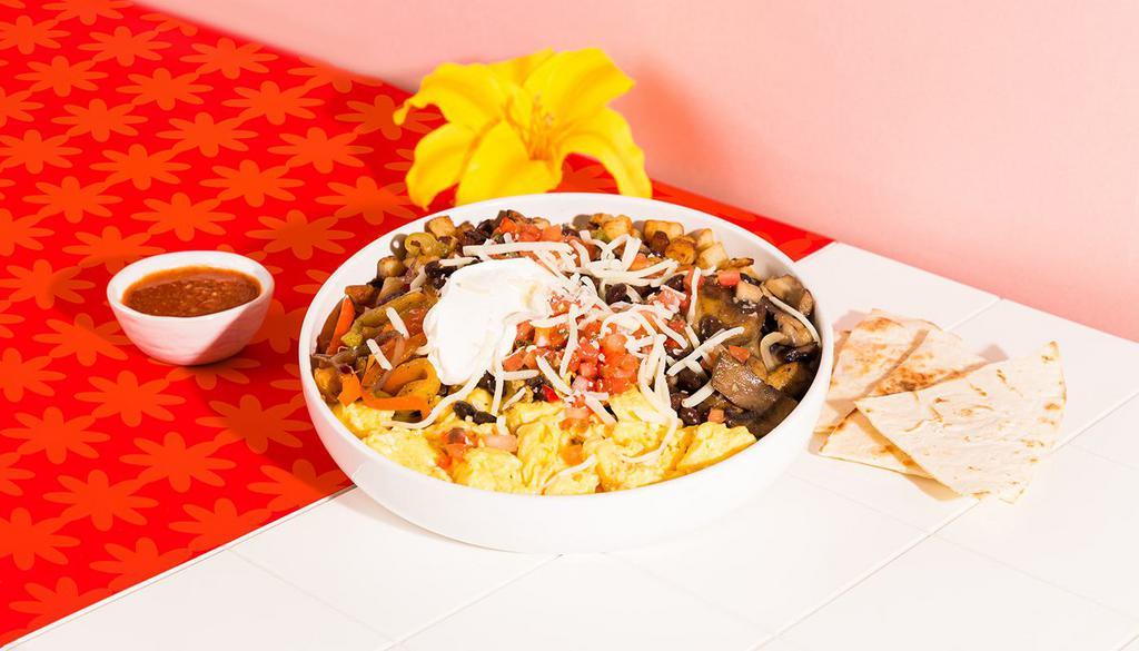 Fajita Veggie Mix Breakfast Bowl · Two eggs, fajita peppers and onions, mushrooms, melted cheese, potatoes, black beans, pico de gallo, served with a side of tortilla.