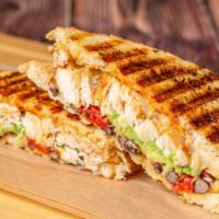Chipotle Chicken Avocado Panini · Chipotle sauce, roasted peppers, chicken breast, avocado slices, Pepper-Jack cheese, and bla...