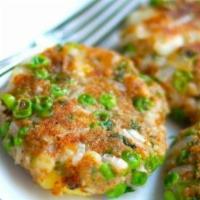 Aloo Tikki · Potatoes patties stuffed with chicken peas and blended of fresh herbs and spices, served wit...