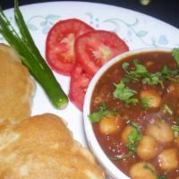 Bhatua/Poori Choley · Deep fried bread with garbanzo beans