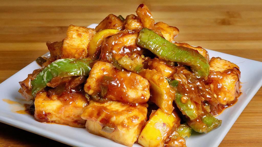Paneer Chilli · Homemade cheese cooked with sliced onions, bell pepper, ginger, garlic, and soy sauce.