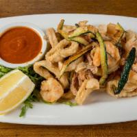 Calamari Fritti · Fried calamari with shrimp and zucchini.