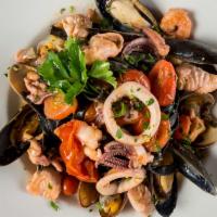 Taglierini Neri Ai Frutti Di Mare · Homemade squid ink pasta with sautéed clams, mussels, calamari, and shrimp, served in olive ...