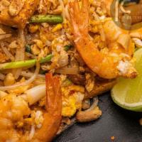 Pad Thai · Rice noodle stir-fried with Thai style sauce, bean sprout, green onion, eggs, tofu, crushed ...