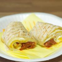 Breakfast Burrito · Choose choice of side. Added to egg and cheese.