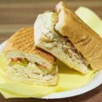 Tuna Melt Sandwich · Tuna salad, tomato, pickles, and mozzarella cheese.