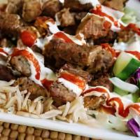 Beef Platter · Beef can be over Rice, Salad or French Fries. All plates come with a side of salad and toppe...