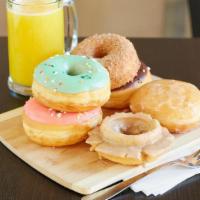 1/2 Dozen Donuts · Assorted: Donut, Bar, Twist, Jelly. 
A variety of delicious donuts selected by our staff. (S...