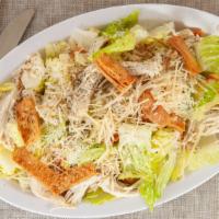 Poulet Au Rie · Boneless white meat chicken, rice and lettuce homemade croutons, tossed with our own homemad...