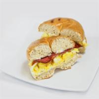 2 Scramble Eggs Bagel · Toasted bagel; Cream cheese, scrambled eggs and bacon.