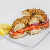 Lox & Bagel · Toasted bagel; Cream cheese, smoked salmon, onion, tomato, capers.