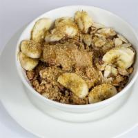 Nutty Acai · Granola, banana, peanut butter, coconut flake, flax seeds, and honey