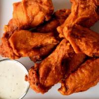 1/2 Lb Wings · Tossed in your choice of BBQ or buffalo sauce with carrots and celery.
