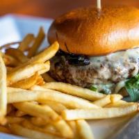 Chophouse Burger · Garlic Aioli, Grilled Onion jam, Sharp White Cheddar, Arugula. Served on a Brioche Bun.