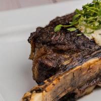 Prime Tomahawk · 32oz. Prime Tomahawk Served With Our House Mushroom Steak Sauce. Choose Two sides of your ch...