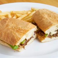 Philly Cheesesteak Sandwich · w/ Fries or Salad.