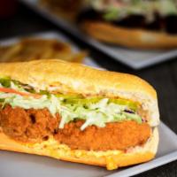 Crispy Chicken Sandwich · Fried chicken with coleslaw, pickles and spread.