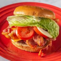 The Bacon Cheeseburger · Burger, lettuce, tomato, American cheese, bacon & House Sauce.
Consuming raw or undercooked ...