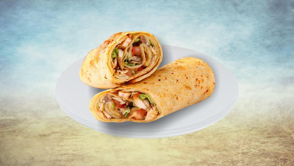 Chunky Chicken Wrap  · Wrap smothered in homemade hummus, topped with finely spiced chicken topped with diced tomatoes, cucumbers, red, green peppers, tzatziki, and garlic sauce.