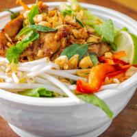 Chicken Noodle Salad · Lemongrass chicken with rice noodles, lettuce, carrot, daikon, green onion, cilantro, Thai b...