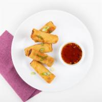 Egg Roll · (1pc) Vegetable filling wrapped in dough and deep fried.