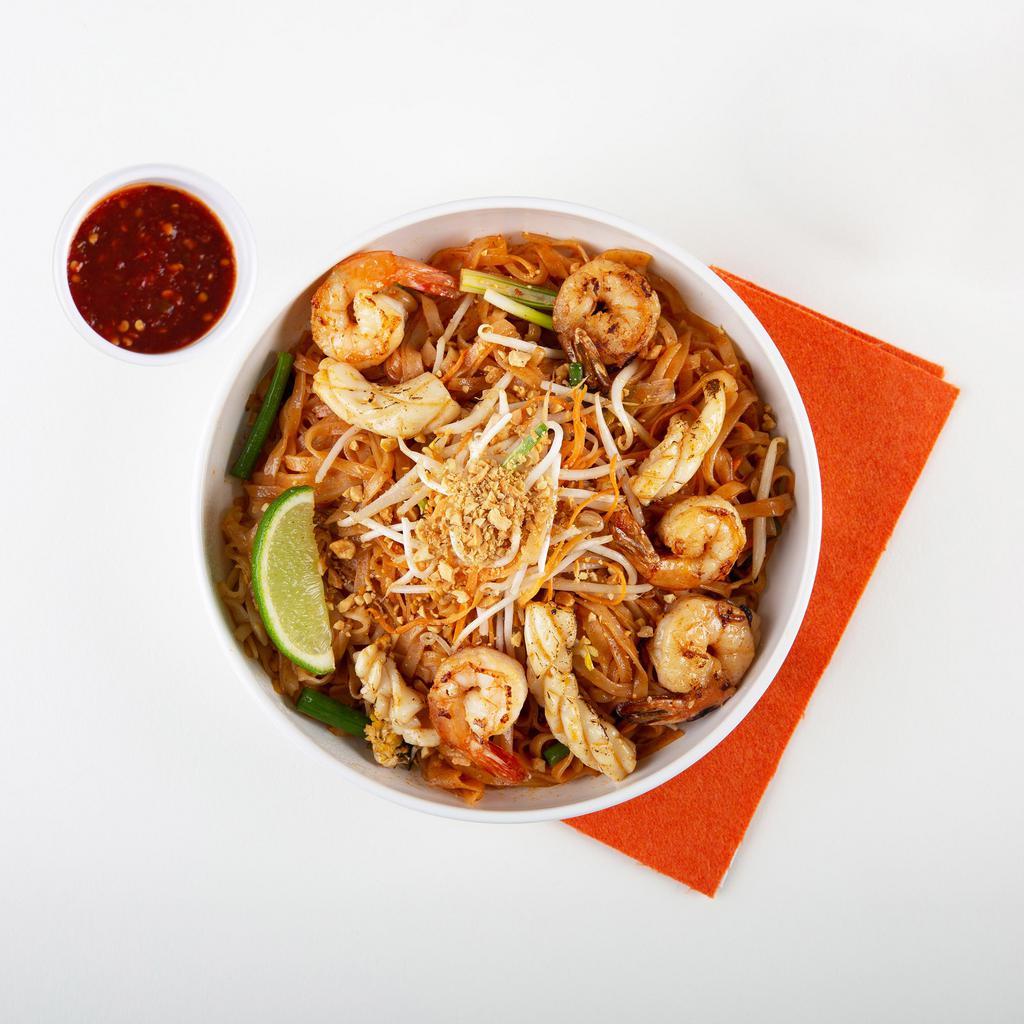 Seafood Pad Thai · Stir-fried rice noodles with shrimp, scallops, squid, scallions, bean sprouts, scrambled egg, and crushed peanuts.