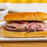 French Dip Tri-Tip Sandwich · Thin sliced tri-tip served on a baguette roll, with a side of au jus sauce. Add cheese ,meat...
