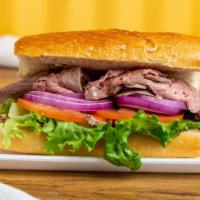 Tri-Tip Sandwich · Thin sliced tri-tip, lettuce, tomato, onion, special sauce, served on a baguette roll. Add c...