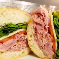 Baked Ham · Served with mustard, mayonnaise, lettuce, tomato and choice of side.