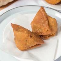 Vegetable Samosa (2 Pieces) · Crispy pastry turnover with mix vegetable and potato.