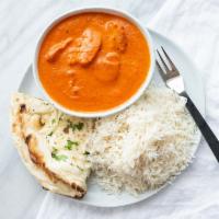 Butter Chicken · Cooked with tomato cream butter sauce.