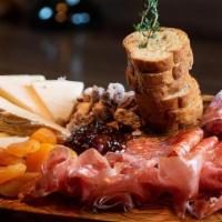 Antipasto Plate · Imported cured meats and assorted cheeses.