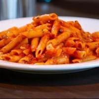 Arrabiata Pasta · Penne pasta in a spicy San Marzano tomato sauce with garlic and parsley.