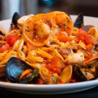 Linguine Pescatore · Shrimp, scallops, clams, mussels, calamari in fresh tomato, garlic and white wine sauce.