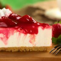 Strawberry Cheesecake · Classic cheesecake with a rich, dense, smooth, and creamy consistency topped with a deliciou...