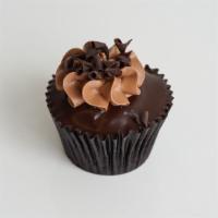 Chocolate Truffle · Chocolate cupcake overfilled with chocolate ganache frosted with a puff of chocolate butterc...