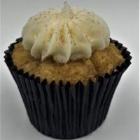 Cinnamon Crumb Cake · Brown sugar cinnamon layered throughout a vanilla cupcake drizzled with vanilla buttercream.
