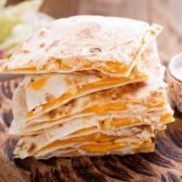 The Cheese Quesadilla · Grilled flour tortilla filled with melted cheese, sour cream, and guacamole.