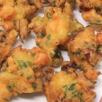 Vegetable Pakora · Vegetables Deep Fried in a thick gram Flour and spices