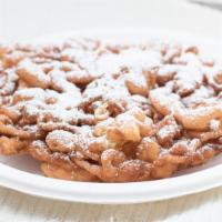 Fundae (Funnel Cake Sundae) · An action-packed dessert with your choice of ice cream, fruit and/or sauce, plus homemade wh...