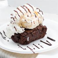 Brownie Sundae · Comes with choice of ice cream, whipped cream, and chocolate sauce.