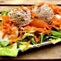 Tuna Salad · Freshly made tuna salad with lettuce, tomatoes, cucumbers, shaved carrots and Italian dressi...